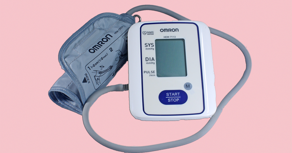 Blood Pressure Monitor on a Pink Background