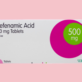 Packet of mefenamic acid on a pink background