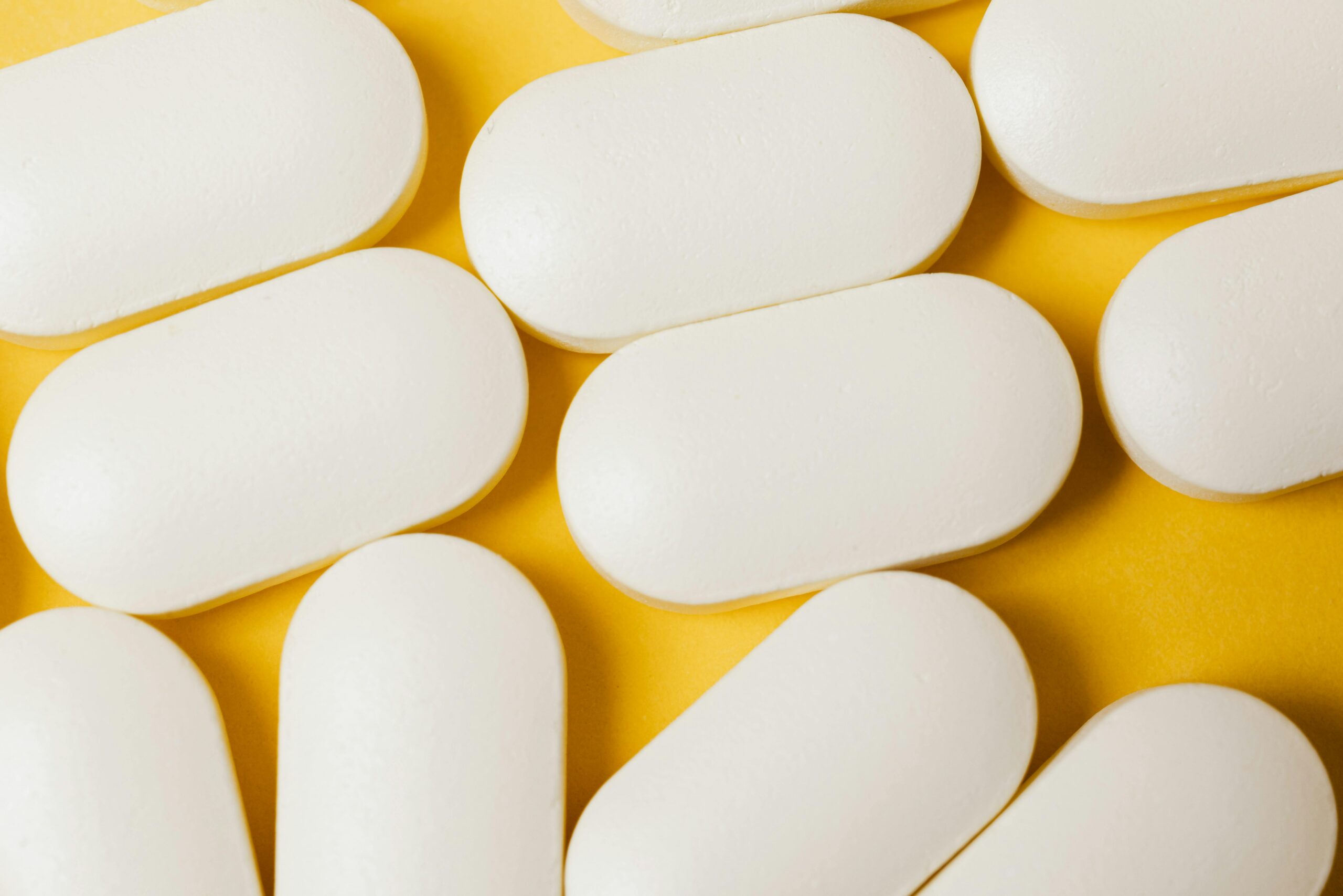 pills with yellow background