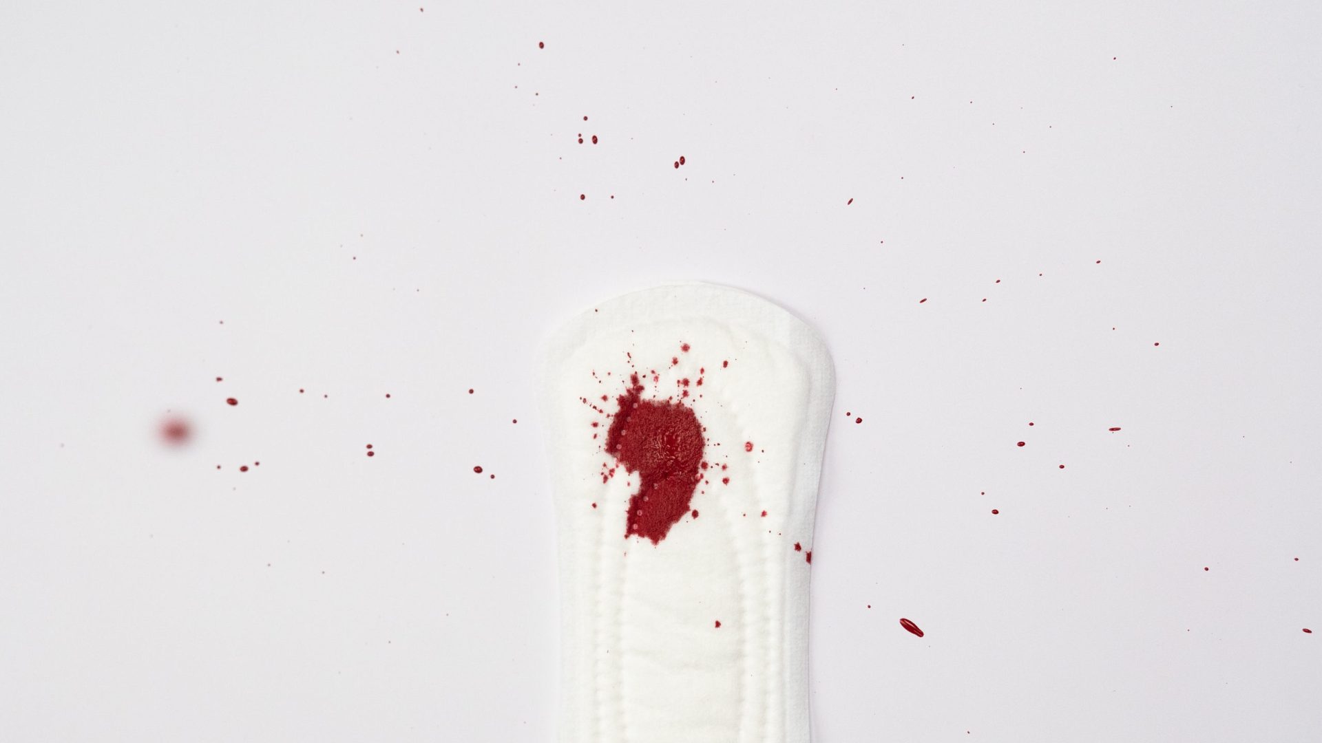 Sanitary pad with blood spotting